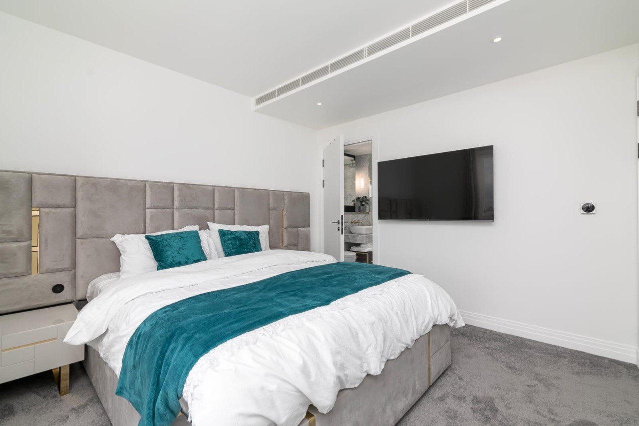 Redecorated bedroom in a London apartment refurbished by MALCON